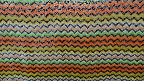 Tess polyspan incas oranje/groen